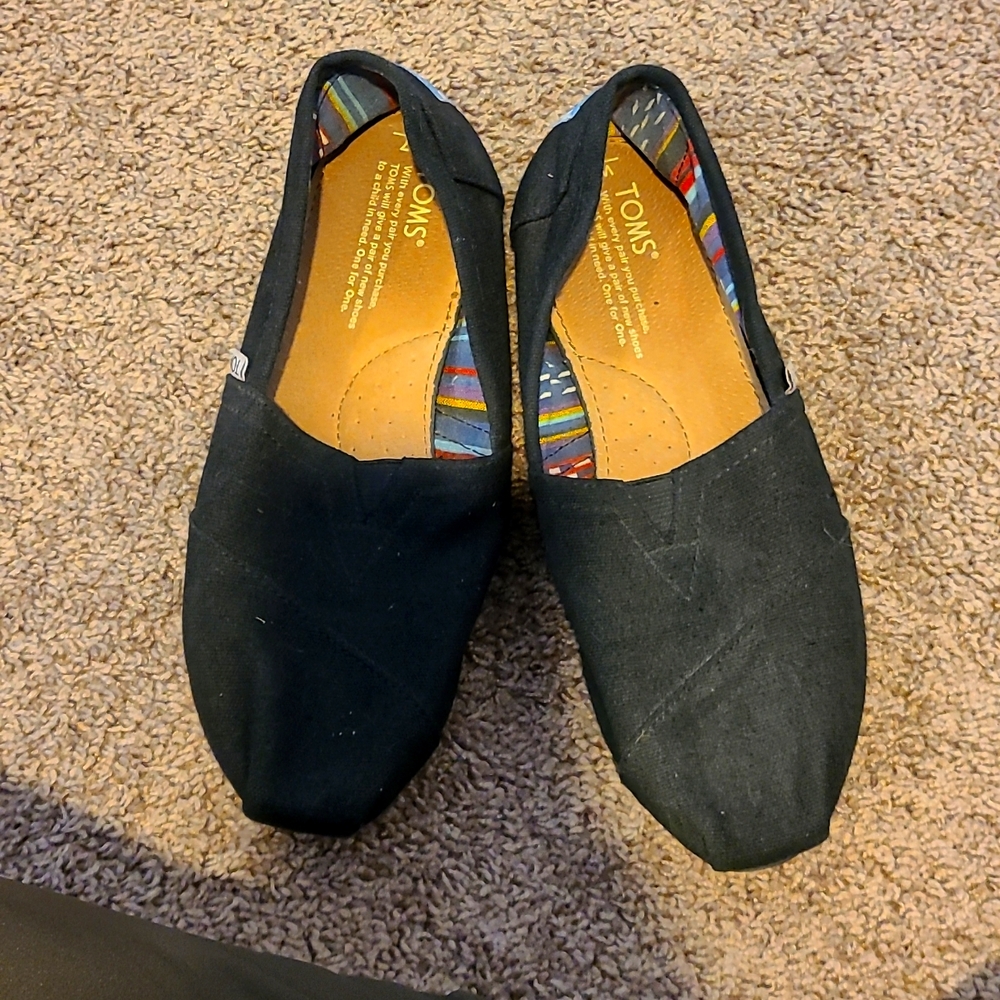 Tom's Black slip on size 7